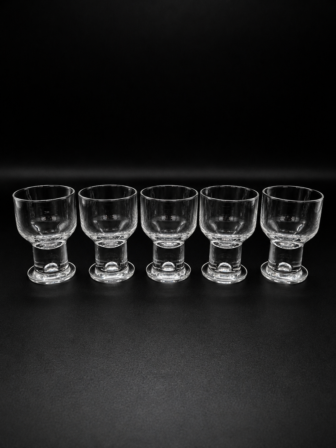 Set of 5 authentic vintage Iittala Helmi wine glasses, designed by Finnish designer Heikki Orvola.